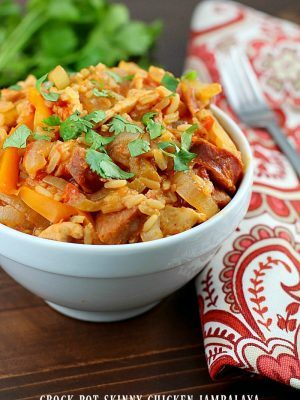 Crock Pot Skinny Chicken Jambalaya! Low calorie, tastes great and fills you up! Using lean proteins, (sliced chicken breasts and turkey sausage) sliced up onions and bell peppers, and rice mix and cooking it all in the slow cooker, makes this jambalaya recipe super easy. So tasty and with few ingredients!