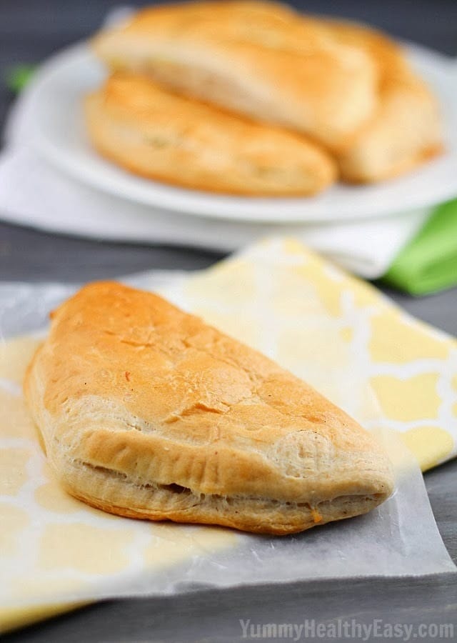 Easy Hand-Held Pot Pies | Refrigerated biscuits filled with easy chicken and veggie pot pie mixture, folded to make a hand pie and then baked. Easy dinner your family will love! Easy Hand-Held Pot Pies