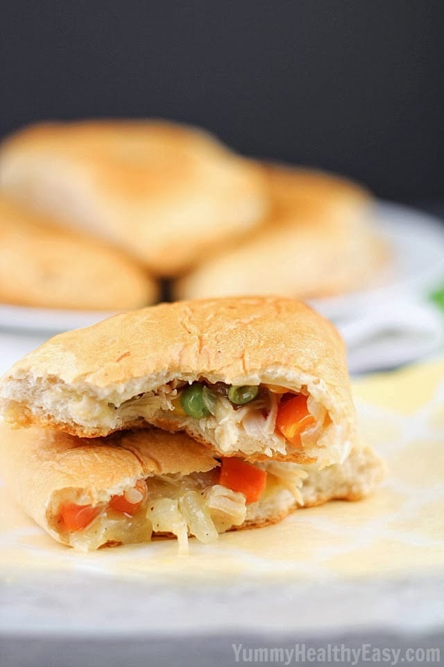 Easy Hand-Held Pot Pies | Refrigerated biscuits filled with easy chicken and veggie pot pie mixture, folded to make a hand pie and then baked. Easy dinner your family will love! Easy Hand-Held Pot Pies