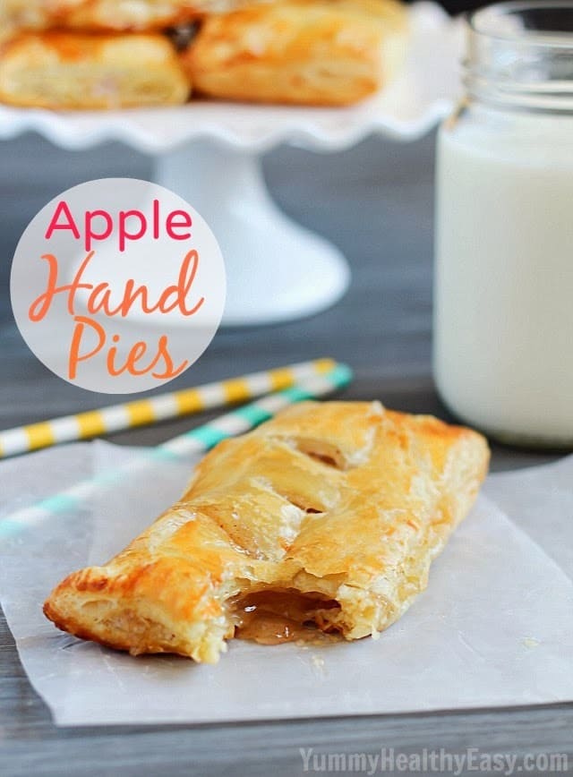 Easy Apple Hand Pies | flaky puff pastry squares filled with homemade (easy) apple pie filling. They're a simpler alternative to apple pie that you can hold in your hand! Apple Hand Pies