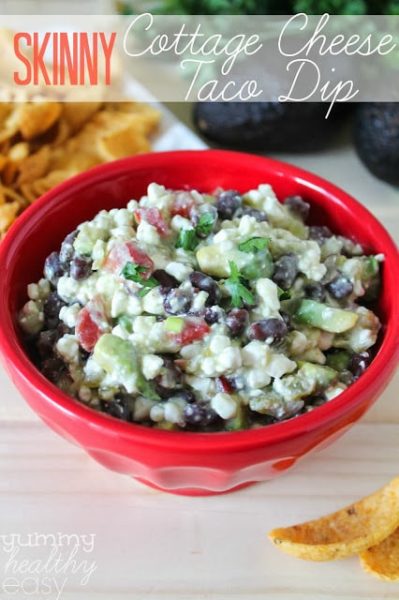 Bright red bowl filled with Cottage Cheese Taco Dip + 43 Healthy Snack Ideas