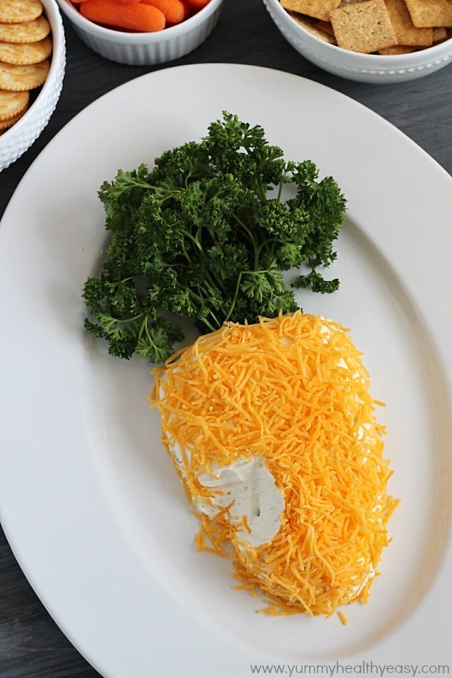 Need a fun treat to bring to an Easter party? Take this carrot-shaped cheese ball! It's sure to win the vote for cutest and tastiest snack! Need a fun treat to bring to an Easter party? Take this carrot-shaped cheese ball! It's sure to win the vote for cutest and tastiest snack!