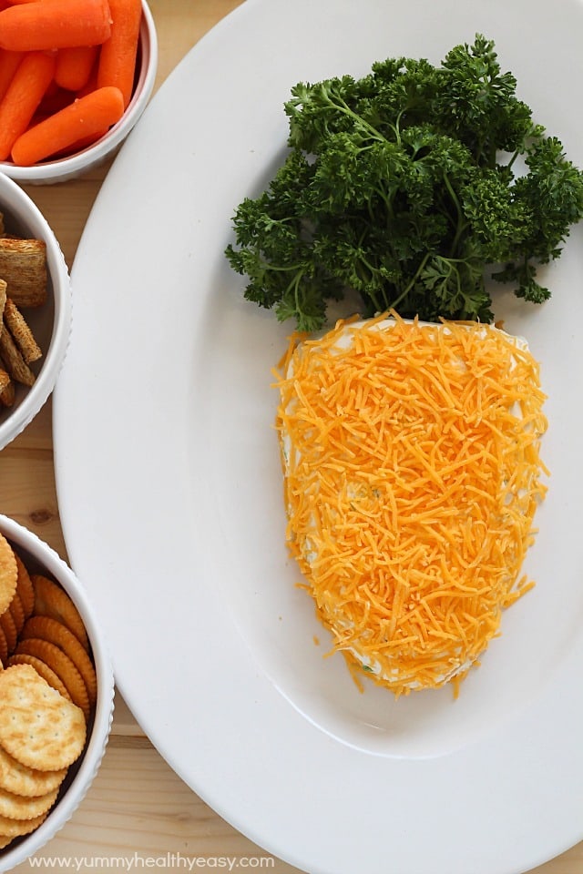 Need a fun treat to bring to an Easter party? Take this carrot-shaped cheese ball! It's sure to win the vote for cutest and tastiest snack! Need a fun treat to bring to an Easter party? Take this carrot-shaped cheese ball! It's sure to win the vote for cutest and tastiest snack!