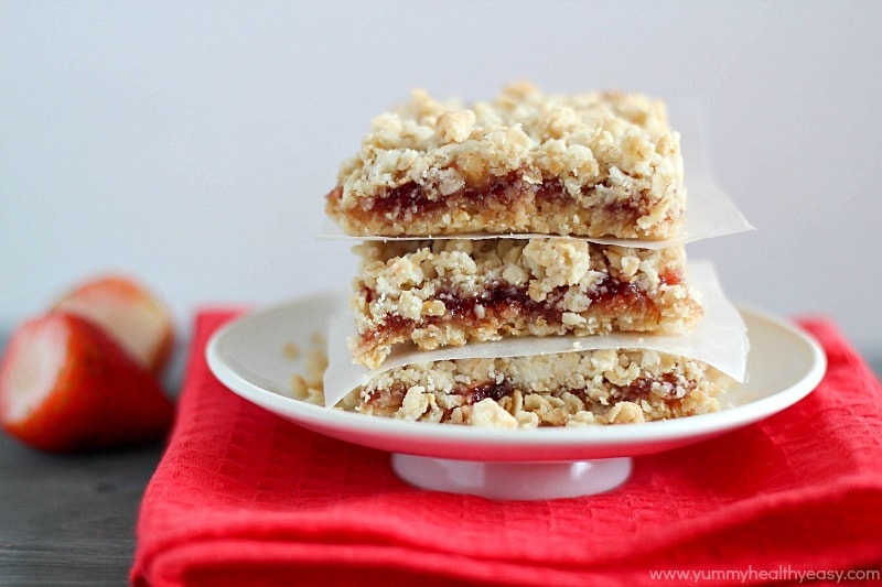 Strawberry Oatmeal Bars | delicious bars using only a handful of easy ingredients (cake mix & strawberry jam!) to make the fastest and yummiest dessert! Strawberry Oatmeal Bars | delicious bars using only a handful of easy ingredients (cake mix & strawberry jam!) to make the fastest and yummiest dessert!