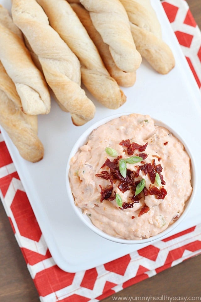 Delicious and super EASY breadsticks (made with Pillsbury Grands! Biscuits) and a warm bacon cheese dip to dunk them in!! Delicious and super EASY breadsticks (made with Pillsbury Grands! Biscuits) and a warm bacon cheese dip to dunk them in!!