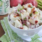 Super easy potato salad recipe using only FOUR simple ingredients! Perfect to serve with your next BBQ. Plus it's gluten-free!