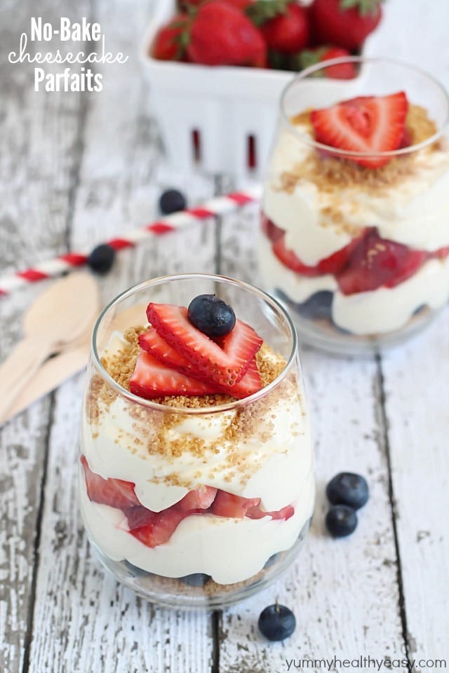 No-Bake Cheesecake Parfaits - layered with graham cracker crumbs, sliced strawberries, blueberries and easy no-bake cheesecake filling. Perfect for 4th of July!