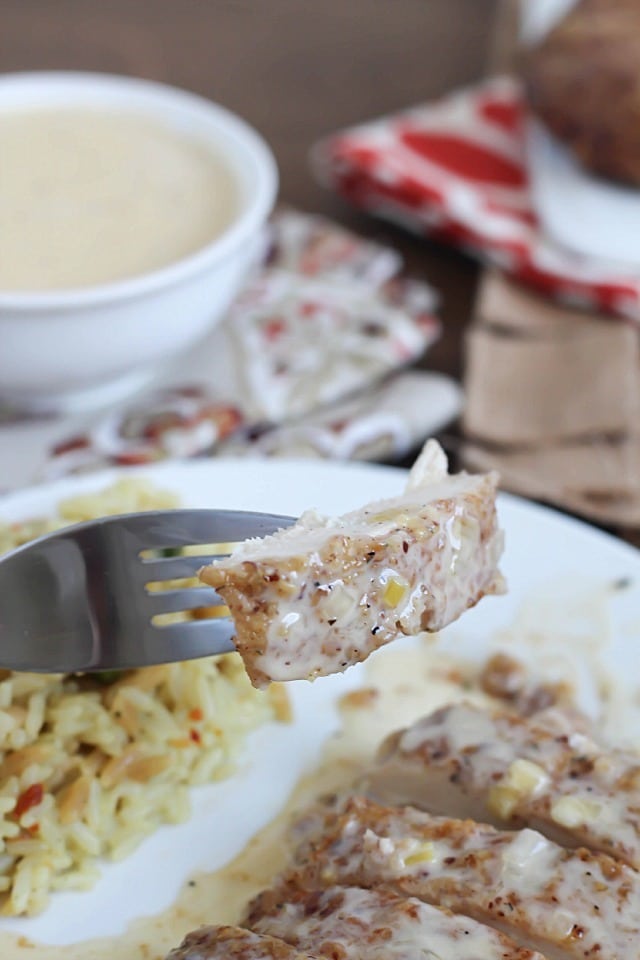Pecan crusted chicken breasts cooked in a skillet, then topped with an apple cream sauce. Unique, unbelievably delicious & so easy!