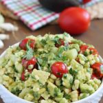 Delicious grilled corn mixed together with avocado, tomato, feta, green onions, cilantro and cucumber then tossed in an easy dressing. The perfect refreshing side dish for a BBQ!