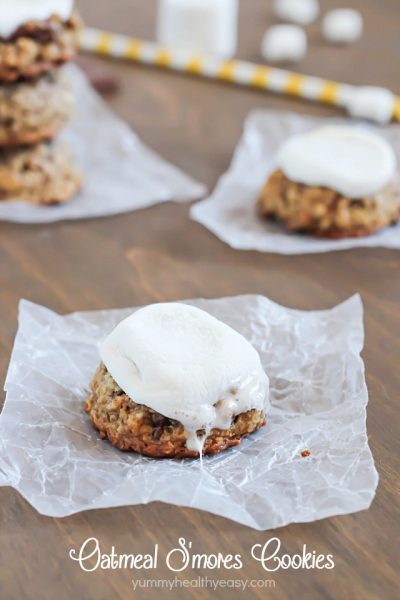Moist and chewy oatmeal cookies with graham crackers and chocolate pieces inside and an ooey gooey marshmallow cooked on the top!