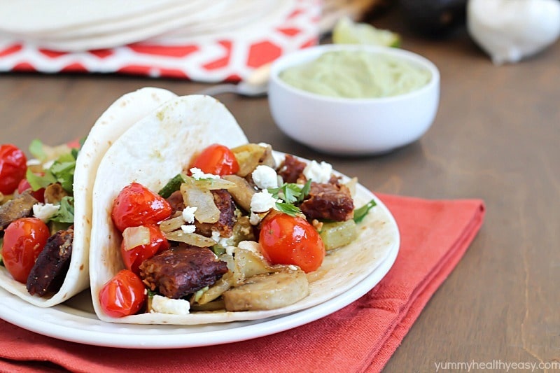 Roasted Vegetable & Black Bean Tacos served with Avocado Crema. Healthy, meatless and delicious! #ad #morningstarfarms