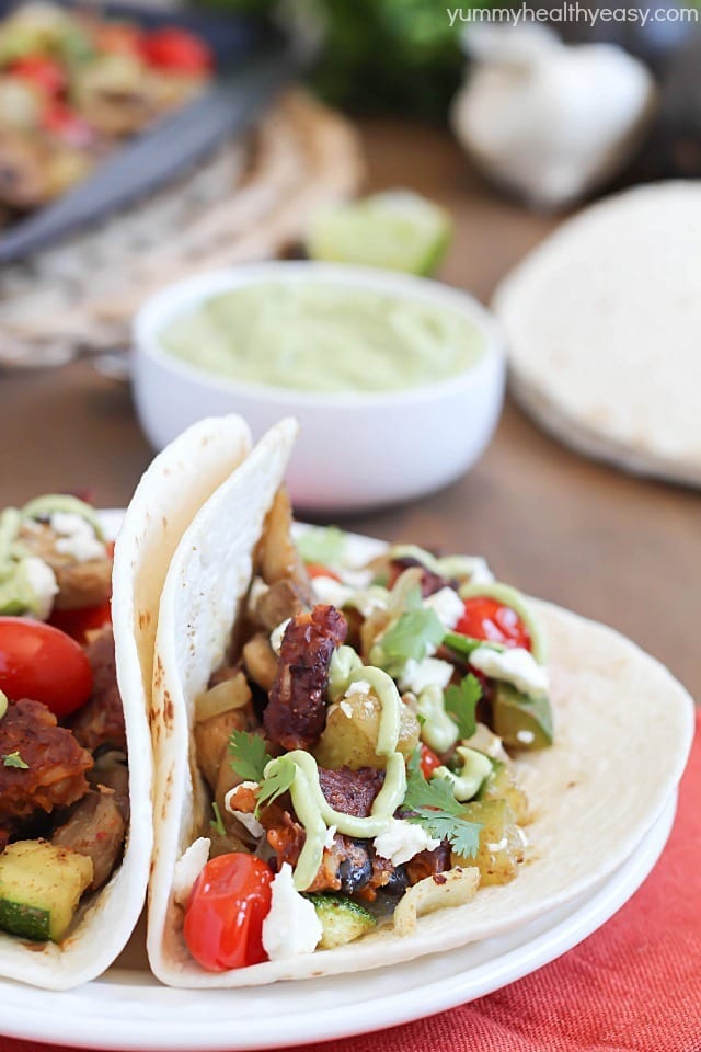 Roasted Vegetable & Black Bean Tacos served with Avocado Crema. Healthy, meatless and delicious! #ad #morningstarfarms