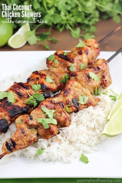 Marinated and grilled Thai Coconut Chicken Skewers over a bed of delicious coconut rice!