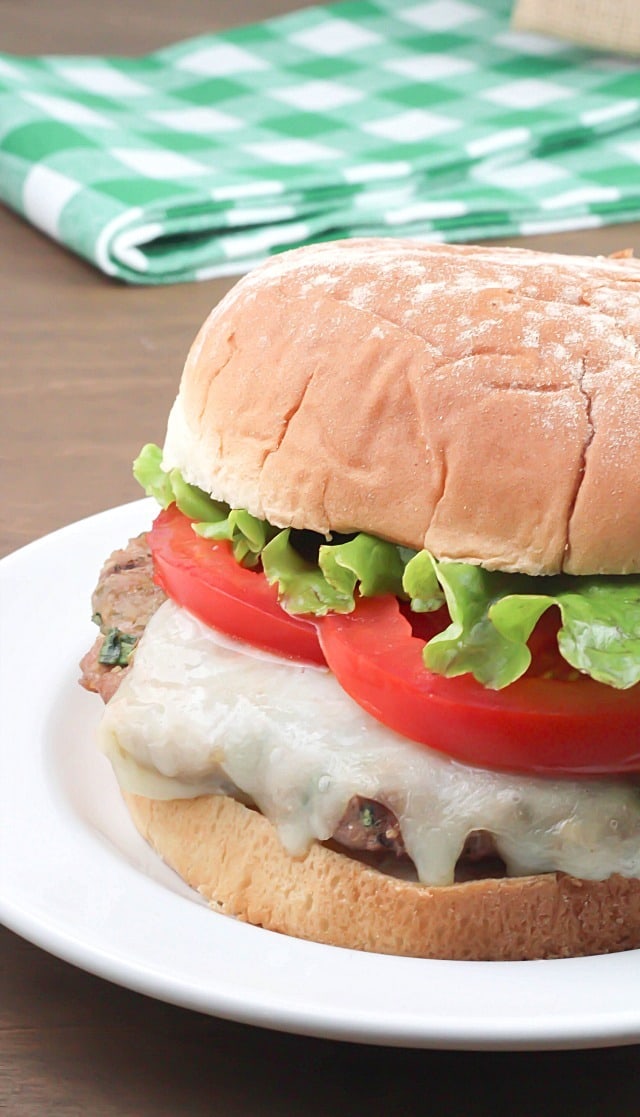 Flavorful Turkey Pesto Burger made with ground turkey, pesto, cilantro and green onions then topped with mozzarella and tomatoes - moist and delicious!