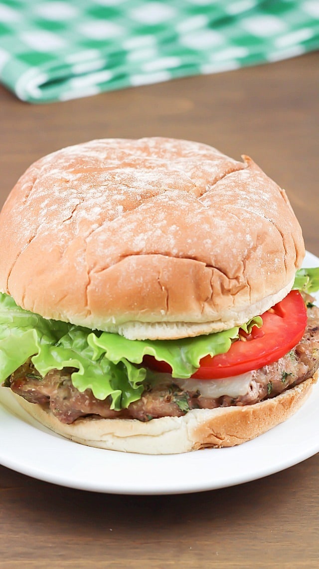 Flavorful Turkey Pesto Burger made with ground turkey, pesto, cilantro and green onions then topped with mozzarella and tomatoes - moist and delicious!