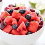 Watermelon Fruit Salad with cherries, blueberries and a delicious mint-lime dressing. Easy, fresh and the perfect summer side dish!