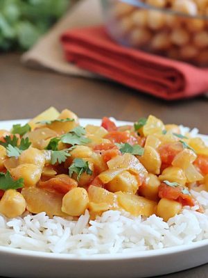 Coconut Chickpea Curry - chickpeas in a creamy curry sauce and served over rice. Quick, easy and absolutely delicious!