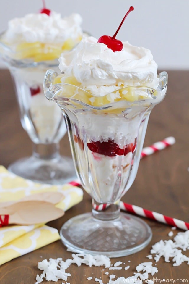 Tropical Trifle - layers of angel food cake, strawberries, pineapple, coconut, cream of coconut & topped with whipped cream! So tasty!
