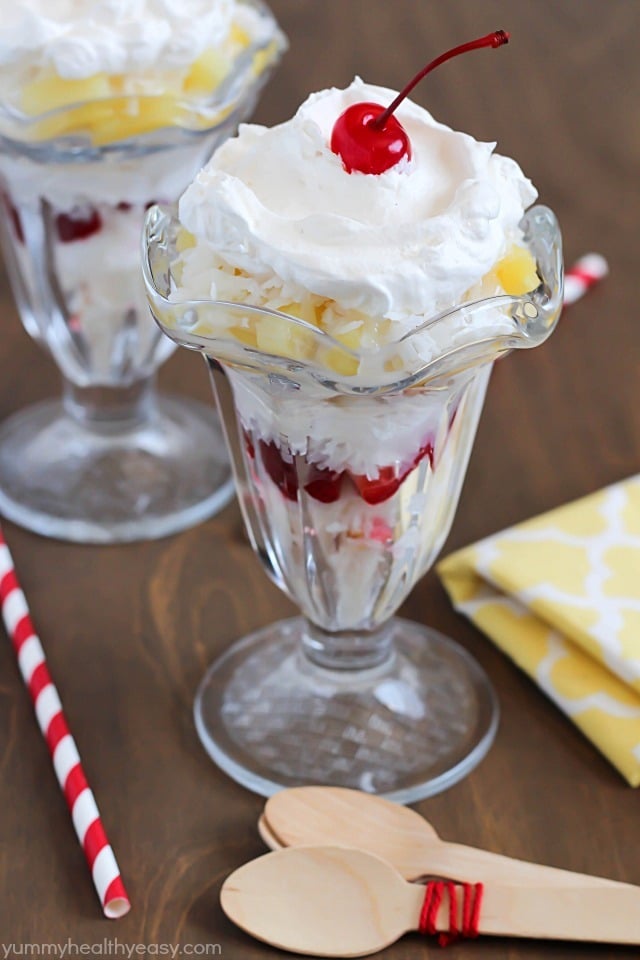 Tropical Trifle - layers of angel food cake, strawberries, pineapple, coconut, cream of coconut & topped with whipped cream! So tasty!