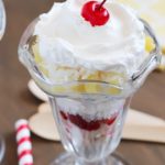 Tropical Trifle - layers of angel food cake, strawberries, pineapple, coconut, cream of coconut & topped with whipped cream! So tasty!