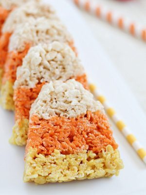 The cutest little Candy Corn Rice Krispie Treats make a fun Halloween snack and/or treat!