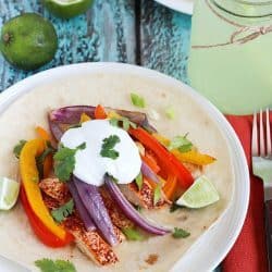 This Quick & Easy Chicken Fajitas Recipe is not only simple, but is healthy and tastes great! The clean up is a breeze, too. My kids love this easy dinner!