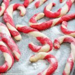 Get the whole family in the kitchen and make these adorable Candy Cane Cookies this holiday season! They're fun to make, super cute and totally delicious!