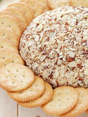 A super easy cheese ball that's sure to impress any guests! It's creamy, tangy, irresistible and won't take more than a few minutes to whip up.