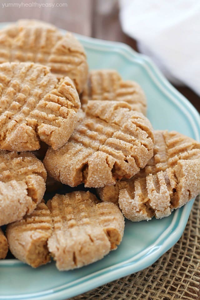 Easy Peanut Butter Cookies that are healthier than most, with less calories and more protein in each cookie. These peanut butter cookies are soft, crumbly and full of peanut butter taste. A true family pleaser! #ad #truvia