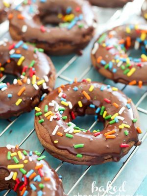 Delicious Baked Chocolate Cake Donuts that are soft, chocolatey and light with the best chocolate glaze on the top. And of course, sprinkles too. :) #CAdairy #ad