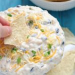Quick Southwest Dip that's perfect for whipping up when entertaining guests or to devour when watching your favorite TV show. Creamy ranch & southwestern flavors, corn, black beans and cheese - so delicious! #cadairy
