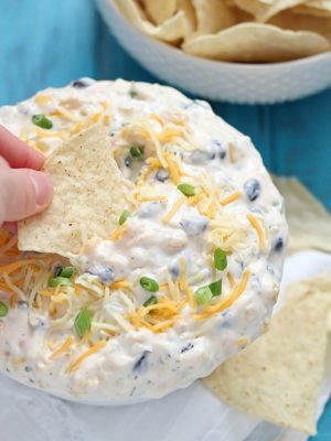 Quick Southwest Dip that's perfect for whipping up when entertaining guests or to devour when watching your favorite TV show. Creamy ranch & southwestern flavors, corn, black beans and cheese - so delicious! #cadairy