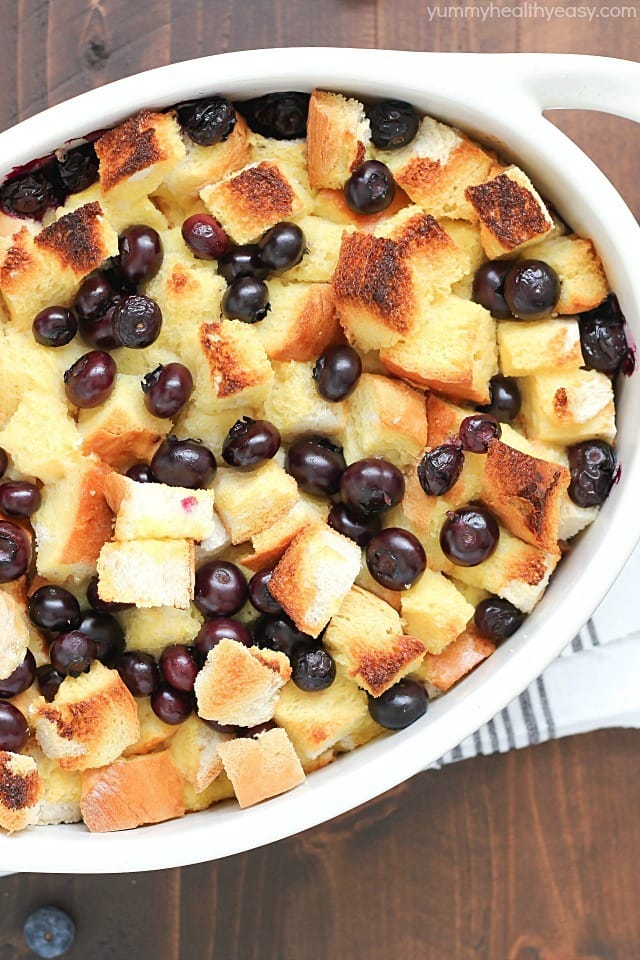 What's better than french toast? Blueberry French Toast Casserole! Delicious casserole with cubes of bread and blueberries baked in an egg and orange juice mixture. Perfect for Easter breakfast... or breakfast any day!
