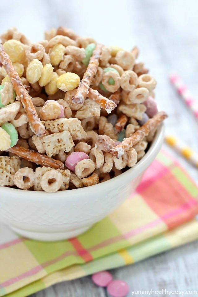 Super delicious and easy Bunny Bait aka Easter Snack Mix. Made with cereal, pretzels, peanuts, pastel M&M candies and white chocolate - perfect for Easter!