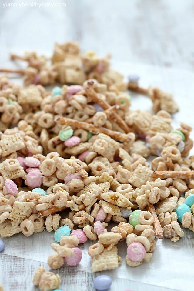 Super delicious and easy Bunny Bait aka Easter Snack Mix. Made with cereal, pretzels, peanuts, pastel M&M candies and white chocolate - perfect for Easter!