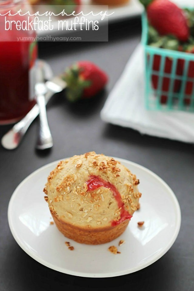 Simply delicious Strawberry Breakfast Muffins filled with strawberry jam!