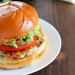 The juiciest, most delicious, guacamole chicken burgers! Super simple to make - serve on buns with a layer of guacamole on the top. Amazing!