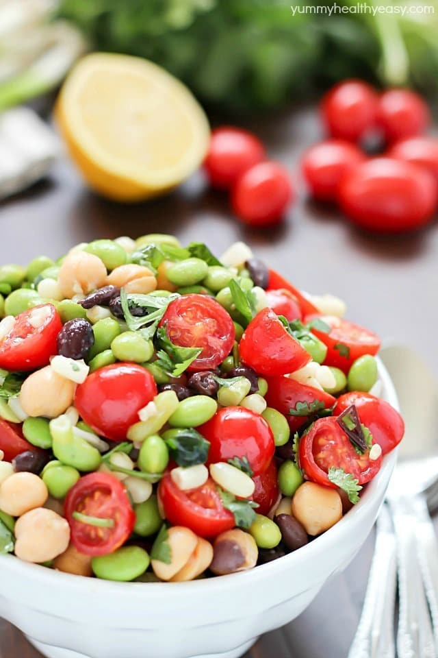Welcome spring by making edamame salad! It's a healthy and delicious salad with a southwestern flair, full of beans, corn, tomatoes, cilantro and of course edamame, all tossed in a delicious light dressing.