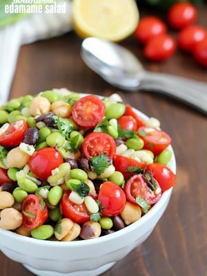 Welcome spring by making edamame salad! It's a healthy and delicious salad with a southwestern flair, full of beans, corn, tomatoes, cilantro and of course edamame, all tossed in a delicious light dressing.