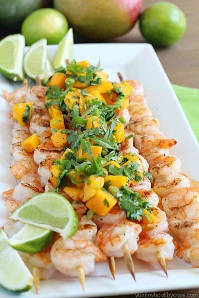 Healthy Grilled Shrimp Skewers with Mango Salsa - an easy and flavorful main dish that's the perfect summertime meal!
