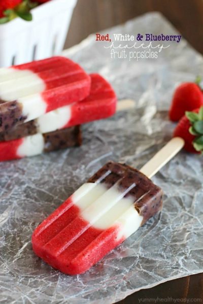 Red, White & Blueberry Healthy Fruit Popsicles - a healthy and easy treat the entire family will gobble up! Perfect to make for Memorial Day or 4th of July... or really anytime. :)