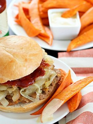 Get ready for the most flavorful spicy turkey burgers with a slathering of caramelized onions on top! Serve with a side of oven baked sweet potato fries (wedges) dipped in a spicy mayo sauce - absolutely divine! #ad