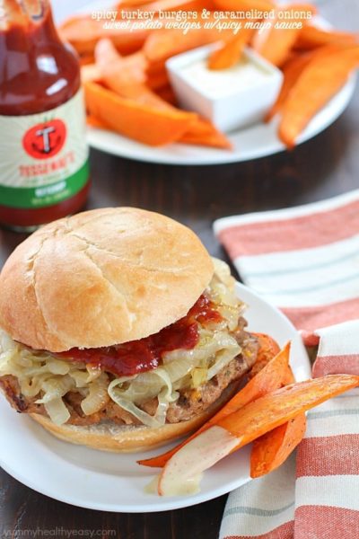 Get ready for the most flavorful spicy turkey burgers with a slathering of caramelized onions on top! Serve with a side of oven baked sweet potato fries (wedges) dipped in a spicy mayo sauce - absolutely divine! #ad