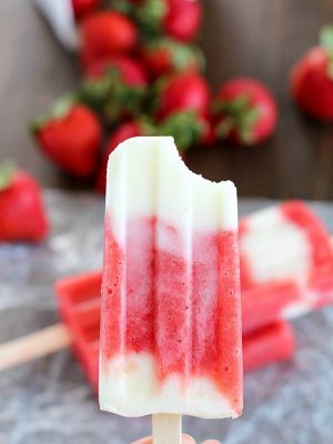 Healthy, easy and delicious Strawberry Yogurt Popsicles - a favorite summer treat everyone in the family will enjoy! Only 4 ingredients!