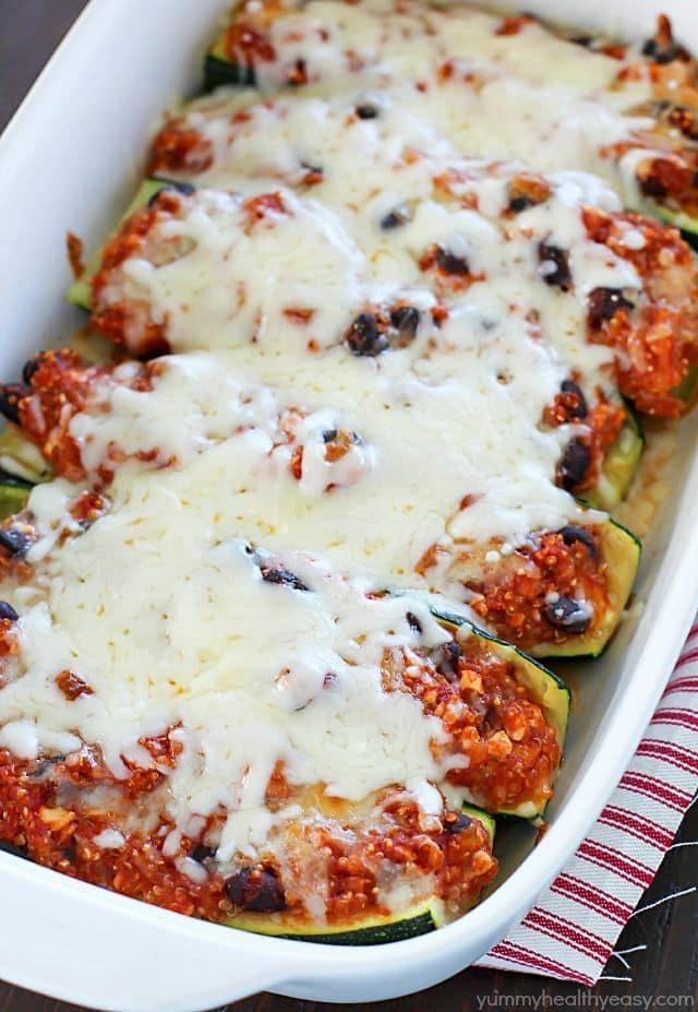 Healthy Black Bean & Quinoa Stuffed Zucchini - a hearty and easy meatless side dish or dinner that's gluten-free and clean-eating. So delicious, you won't even think it's healthy!