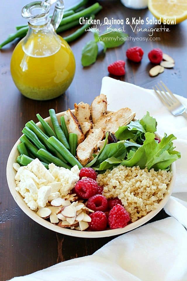 Check out this yummy salad bowl recipe full of grilled chicken, cooked quinoa, kale, raspberries, sliced almonds, feta cheese, green beans and a homemade basil vinaigrette. Super healthy and absolutely delicious! #OrganicBound #Ad