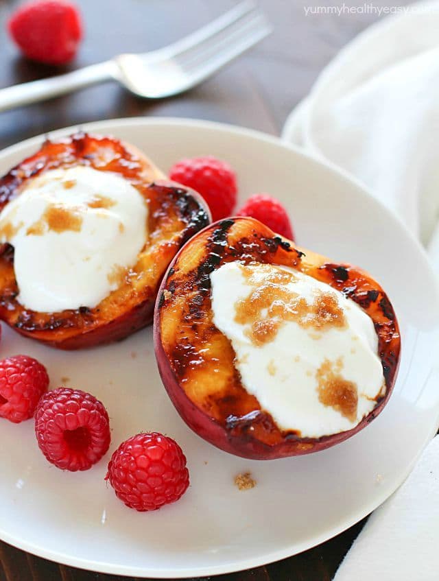 Don't put away that grill after dinner! Throw some peaches on and let them caramelize with brown sugar, then fill them with yogurt. This healthy & easy grilled peaches dessert will blow your mind! #truvia #ad