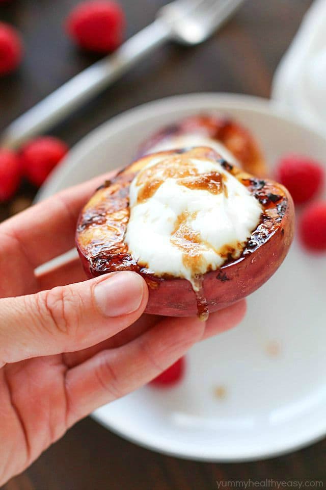 Don't put away that grill after dinner! Throw some peaches on and let them caramelize with brown sugar, then fill them with yogurt. This healthy & easy grilled peaches dessert will blow your mind! #truvia #ad
