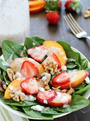 Spinach Salad with strawberries, peaches, candied walnuts, goat cheese and a crazy good (and crazy easy) homemade poppyseed dressing! PLUS a Blendtec Giveaway!