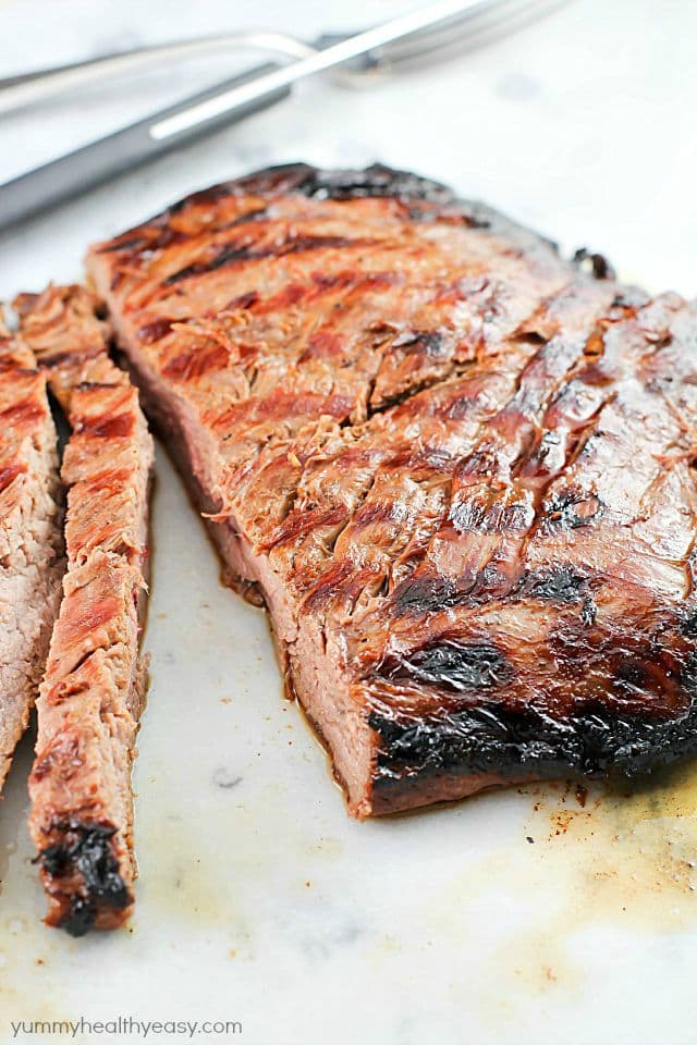 This Asian Marinated Flank Steak has few ingredients but tastes AMAZING!! Super simple and doesn't take long to cook, but is flavorful, juicy and tender. A must-make!